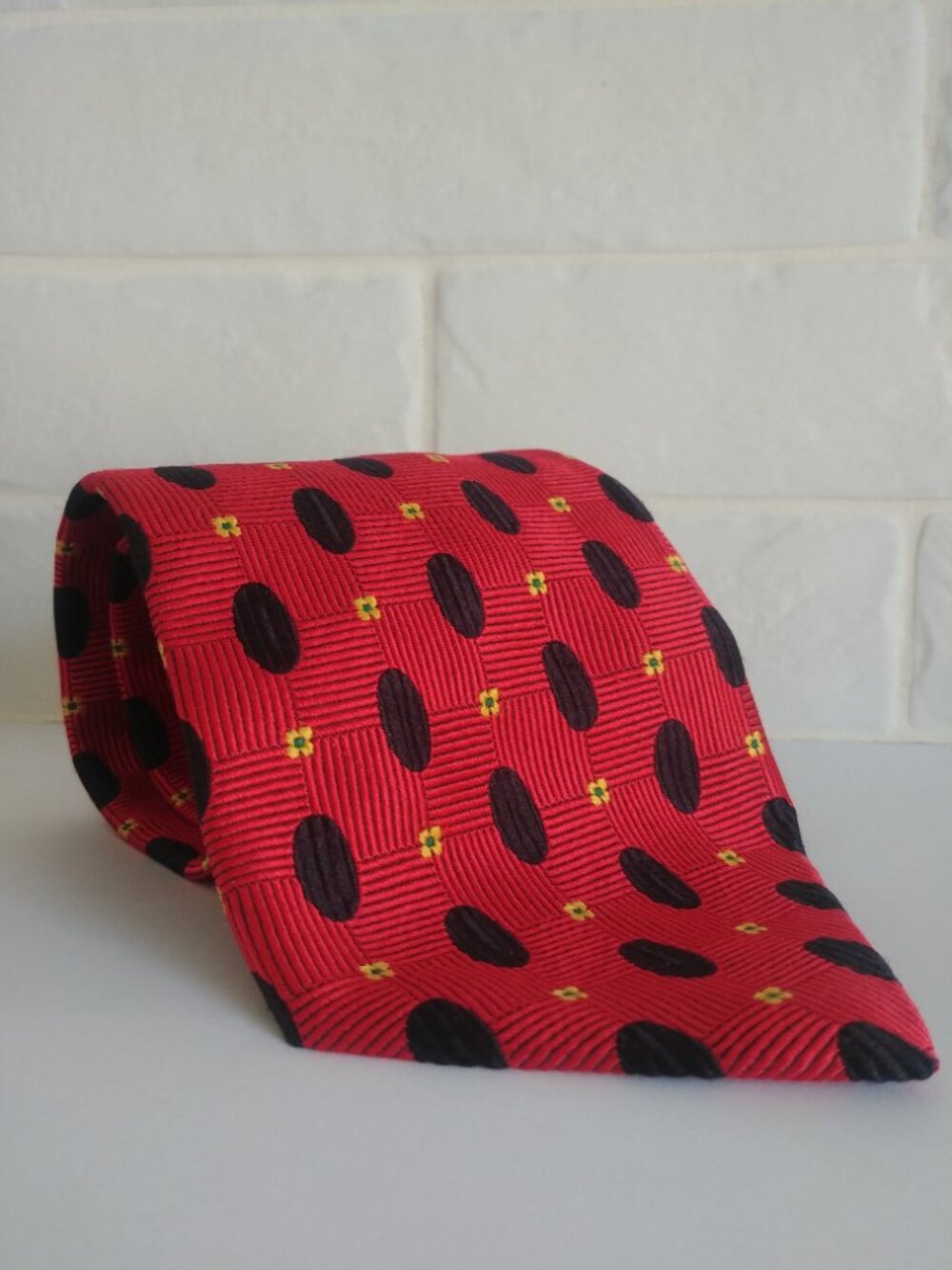 100% silk made in Italy red tie with black yellow geometric floral patte…